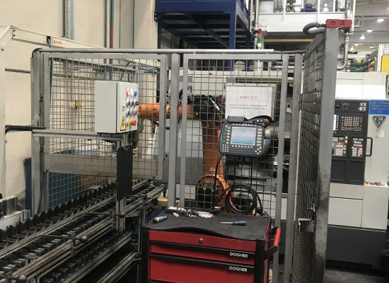 ROBOT LOADING CELL TO A CNC LATHE